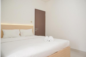 Comfy and Homey 2BR Transpark Cibubur Apartment By Travelio